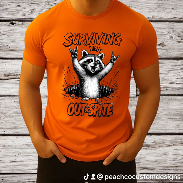 Raccoon Rocker T-Shirt | Surviving Out of Spite | Unisex Humor Top, Gift for Animal Lovers, Fun Casual Wear, Music Lovers Tee, Unique